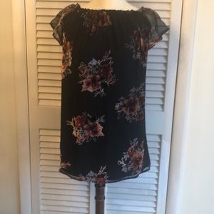 Black mini dress with roses. Can be worn on or off the shoulders.